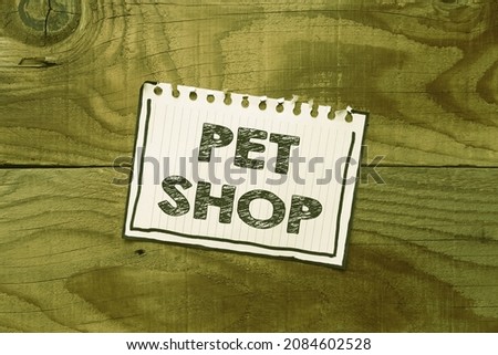 Conceptual caption Pet Shop. Business showcase Retail business that sells different kinds of animals to the public Setting New Ideas Creating Fresh Thoughts Seeking Purpose Planning Ahead