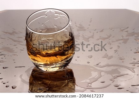 
whiskey in a transparent glass