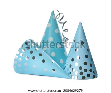 Colorful party hats on white background. Festive items