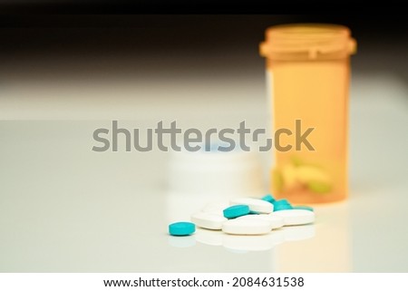 medical drug near bottle for cure disease in pharmaceutical prescription medication treat illness or vitaminor pain or abuse concept