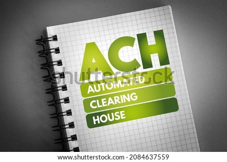 ACH Automated Clearing House - computer-based electronic network for processing transactions, acronym text concept on notepad Royalty-Free Stock Photo #2084637559