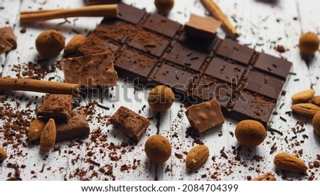 Compositions of sweets, chocolate and nuts.