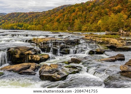 Sandstone Falls With Fall Color, New River Gorge National Park, West Virginia, USA Royalty-Free Stock Photo #2084741755
