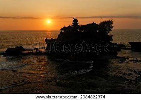 Sunset at temple Pura-Tanah-Lot, Bali, Indonesia Royalty-Free Stock Photo #2084822374