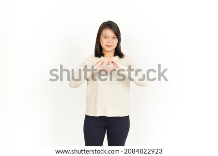 Showing Heart Sign of Beautiful Asian Woman Isolated On White Background