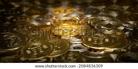 Gold Bitcoin and Ethereum crypto coins. Cryptocurrency, Virtual money, DeFi, Mining and blockchain concept.