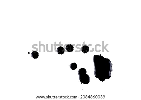 Colorful ink splashes. Paint splatters on bright material. Multi color dots. Watercolor on white paper. Artistic black paint hand made creative wet dirty ink or oil drop spots silhouette isolated Royalty-Free Stock Photo #2084860039