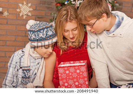 Christmas Kids. Happy Children Opening Gifts. New Year. 