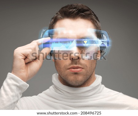future, technology and people concept - man in futuristic glasses Royalty-Free Stock Photo #208496725