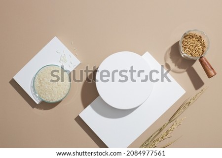  traditional food wheat and rice with white podium in light purple background for product advertising , traditional food content , top view
