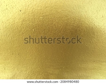 Golden concrete wallpaper texture backdrop for background 