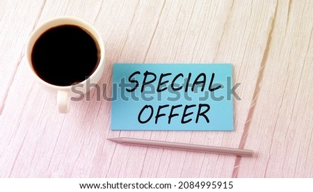 Special offer concept. Sandglass, hourglass or egg timer on wooden table showing the last second or last minute or time out