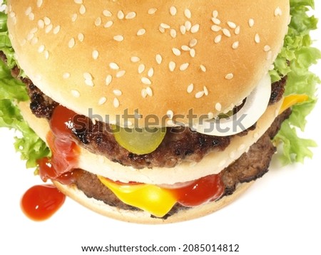 Grilled double Cheeseburger isolated on white background. Top View.