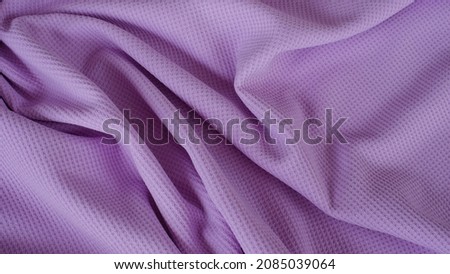 Spandex jersey knit fabric texture with elegance and drapery textile patterns in soft purple color. Luxury and beautiful fabric material. Royalty-Free Stock Photo #2085039064