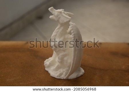 3d sculpture of a dragon Royalty-Free Stock Photo #2085056968
