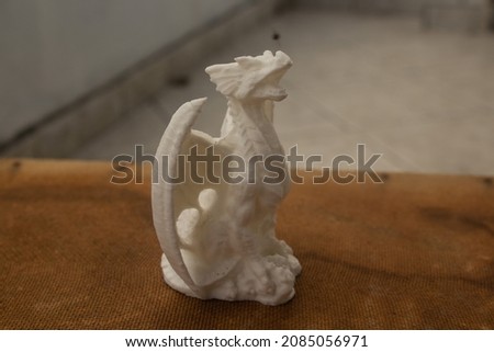3d sculpture of a dragon