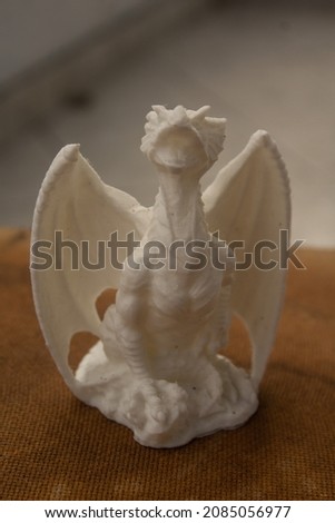 3d sculpture of a dragon. Royalty-Free Stock Photo #2085056977