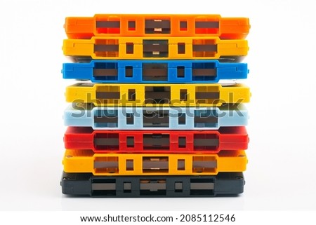 Collection of colorful audio tapes on white background