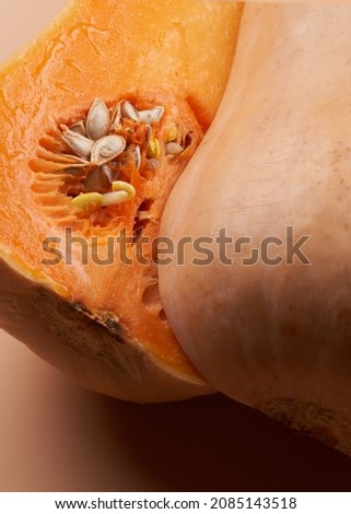 Sliced ripe pumpkin close up orange background