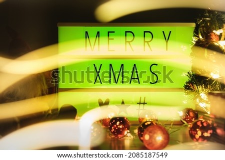 Letter board light box with MERRY XMAS text. Christmas concept.
