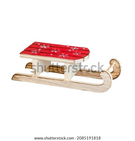 christmas tree toy in the form of wooden sleigh isolated on white background