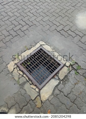 drainage channel with iron cover photo