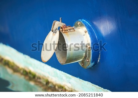 Scupper hole for water drainage water from main deck of the boat. Royalty-Free Stock Photo #2085211840