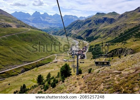 Nature landscape from a chairlift on a sunny day with clouds