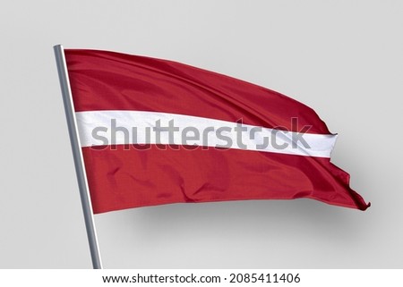 Latvia flag isolated on white background. close up waving flag of Latvia.