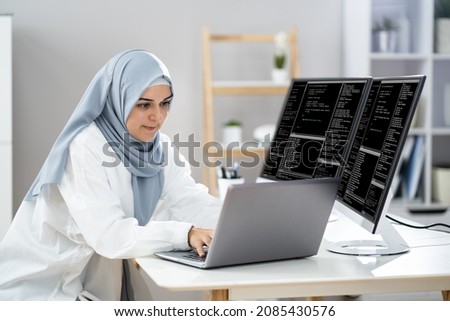 Programmer Woman Wearing Hijab Working. Coding Business Software