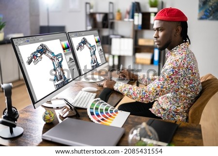 African Graphic Web Designer Using Design Editing Software
