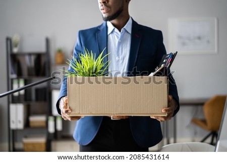 Fired Employee With Box. Unemployed Businessman Moving Royalty-Free Stock Photo #2085431614