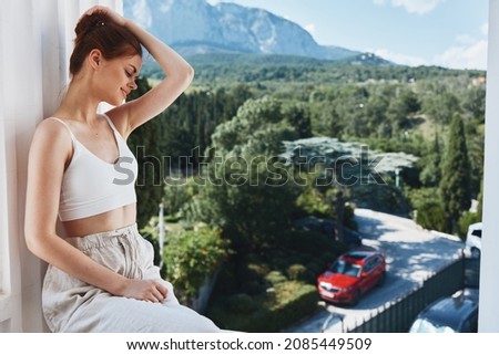 pretty woman comfortable hotel luxurious green nature view sunny day