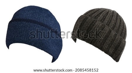  two hats isolated on white background .knitted blue black and balck hats front side view .