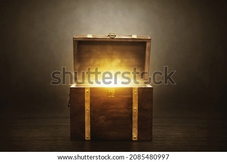 Wooden treasure chest on dark background Royalty-Free Stock Photo #2085480997