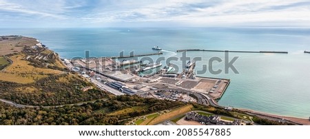 Aerial view of the Dover harbor with many ferries and cruise ships entering and exiting Dover, UK. Royalty-Free Stock Photo #2085547885