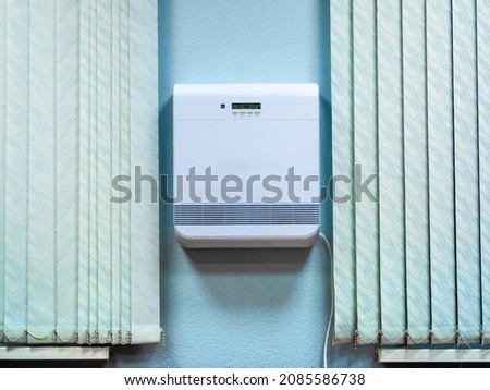 stationary device for forced ventilation of air in an office or apartment, selective focus Royalty-Free Stock Photo #2085586738