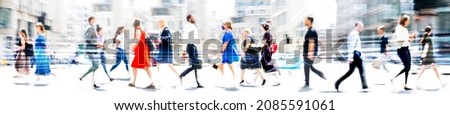Lots of walking people, multiple exposure illustration represents modern life the big busy city. Business people, young people, students crossing the road Royalty-Free Stock Photo #2085591061