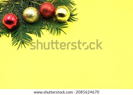 Blank card with holiday jewelry and yellow background.
