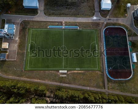Football field at the country club. Aerial view. Drone view. Playing football in the countryside. 