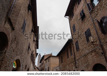 San Gimignano is a city in Tuscany. Surrounded by 13th century walls, the centerpiece of its historic center is Piazza della Cisterna.In the skyline of medieval towers stands the Torre Grossa in stone