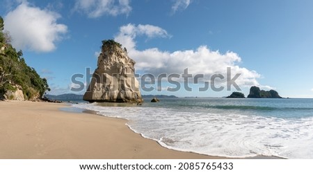 The big rock at the beach cathedral cove in Coromandel, New Zealand - longexposure photography