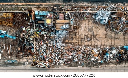 Many containers for collecting scrap metal, collecting metal for secondary raw materials. Metal waste for recycling. Ferrous scrap, non-ferrous scrap. Import and export of scrap. View from above Royalty-Free Stock Photo #2085777226
