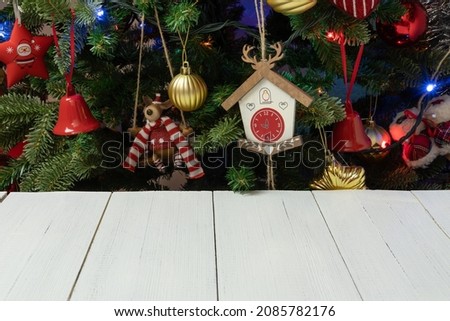 Beautiful Christmas background with ornate Christmas tree and white wooden boards, copy space.