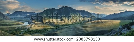 Mountain valley in contrasting evening light, large panorama, Altai Royalty-Free Stock Photo #2085798130