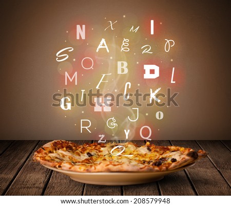 Fresh italian pizza with colorful letters on wood deck
