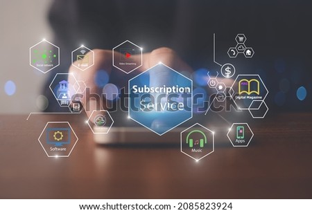 Subscription business model concepts.Close-up of man hands using mobile phone Royalty-Free Stock Photo #2085823924