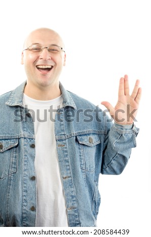 fat bald man wearing jeans jacket makes Vulcan salute