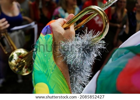 A man plays trumpet during the Charanga do Franca Carnival block party in Sao Paulo, Brazil.