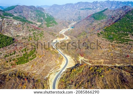 Aerial photography of the curved roads in the mountains